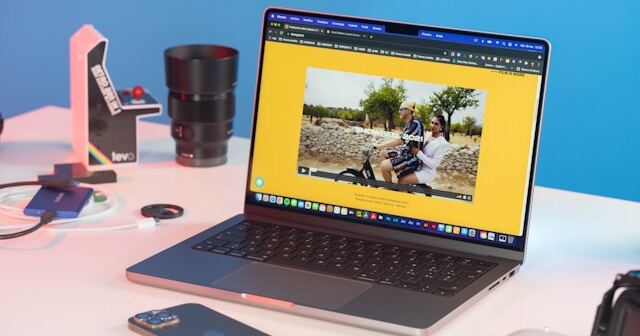 Beginner photographer reviewing portraits on a computer using AI photo editing software Best AI Photo Editing Software for Beginners in 2026: Easy Tools for Stunning Photos