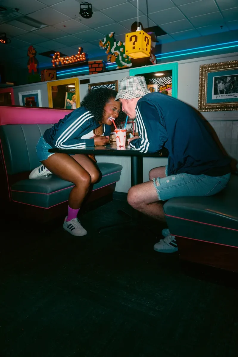 Cinematic portrait photography of a laughing couple by Crystal Monique