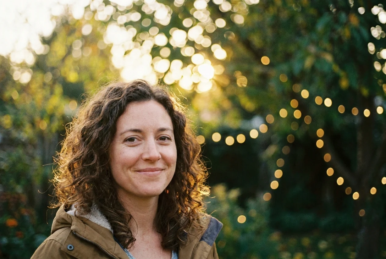 Portrait subject with soft circular highlight blur behind them to show what real bokeh looks like beyond ordinary background blur