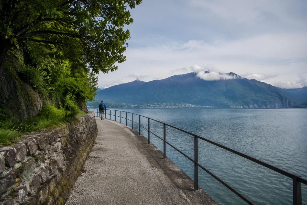 Path leading through a frame toward a person placed near a rule of thirds intersection