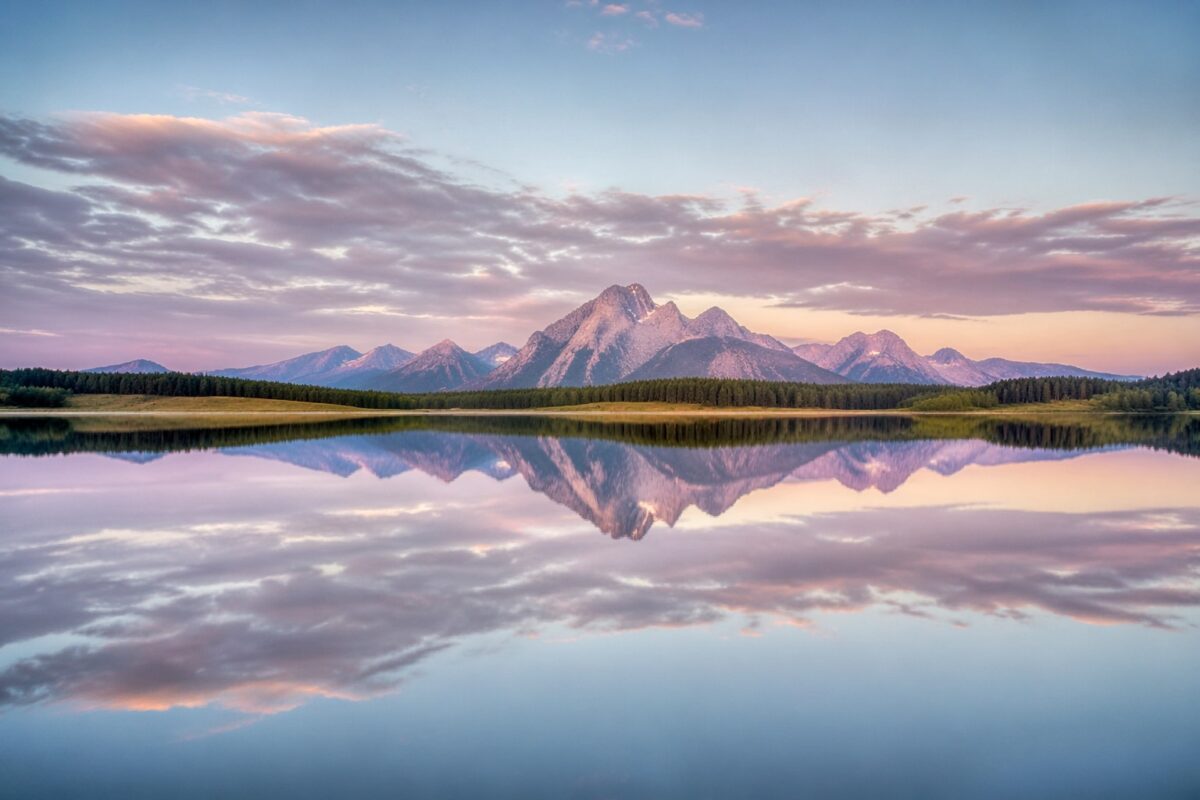 centered horizon reflection composition Centered horizon reflection composition with calm water and balanced sky