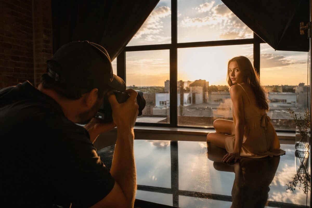 Photographer exposing carefully in a high contrast backlit scene