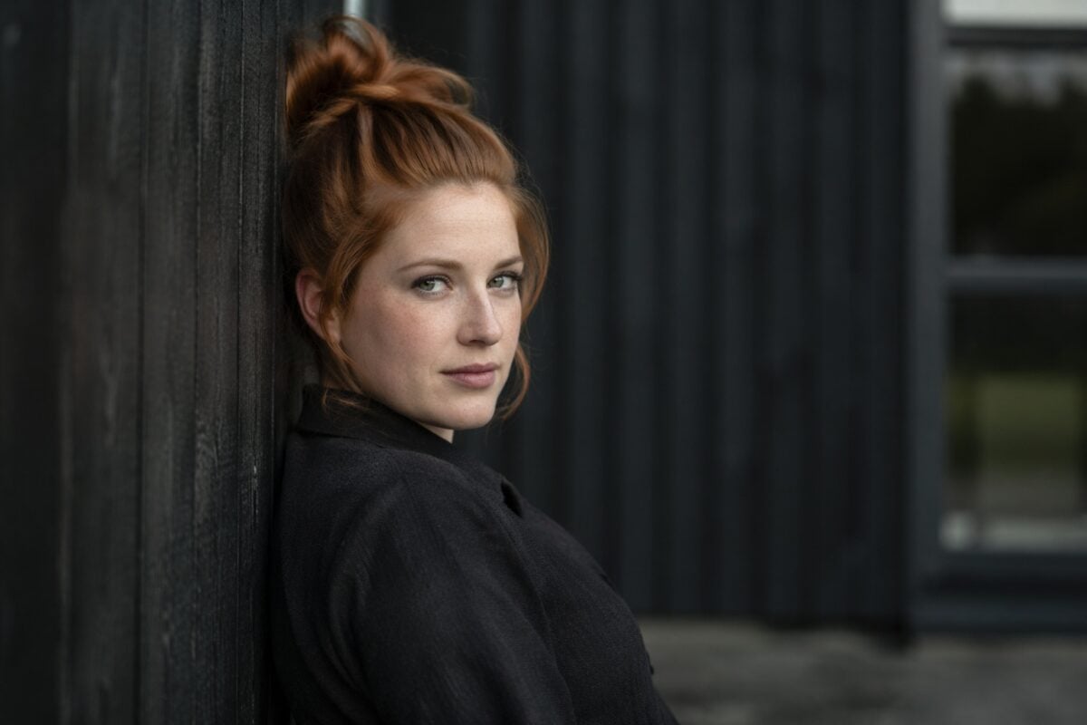 Portrait subject gaining separation from the background through controlled contrast