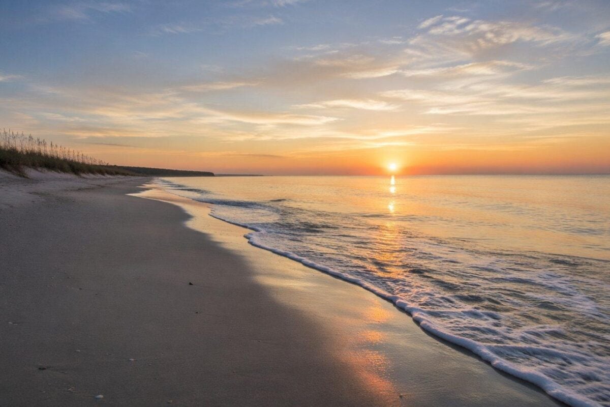 Beach scene photographed in soft morning light with clean color and gentle waves