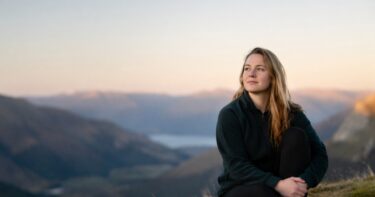Photographer composing an off-center portrait with clear subject placement and breathing room