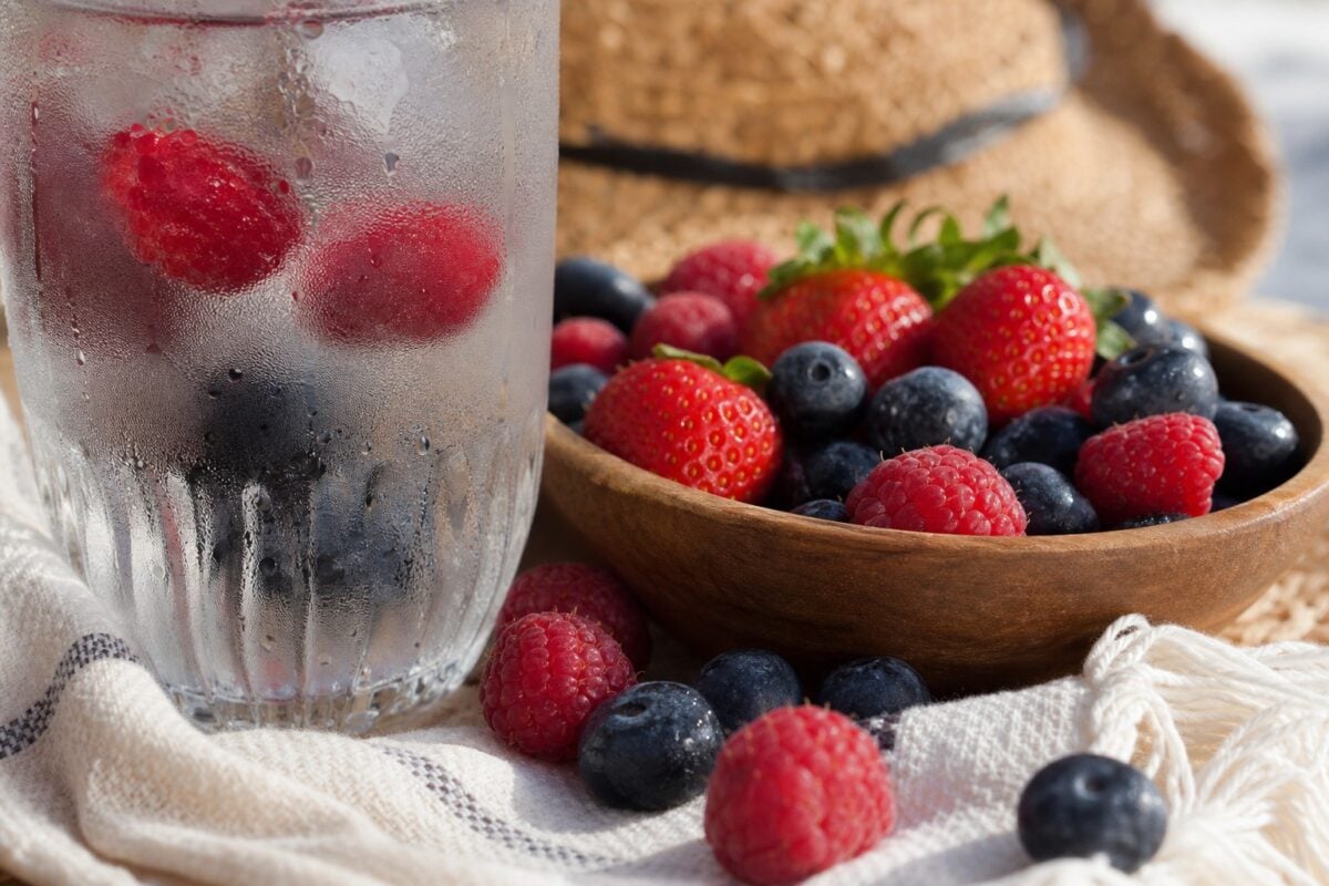 Close-up summer detail photo of condensation and fruit in soft natural light