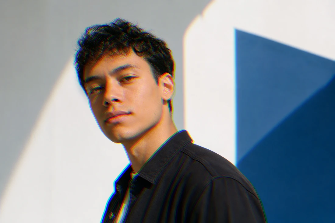evoto glitch soft shift source Studio portrait with crisp outlines and a blue geometric background, suitable for a subtle RGB shift edit