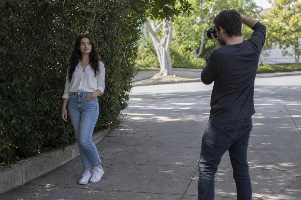 image 45 Photographer evaluating outdoor natural light before posing a portrait subject